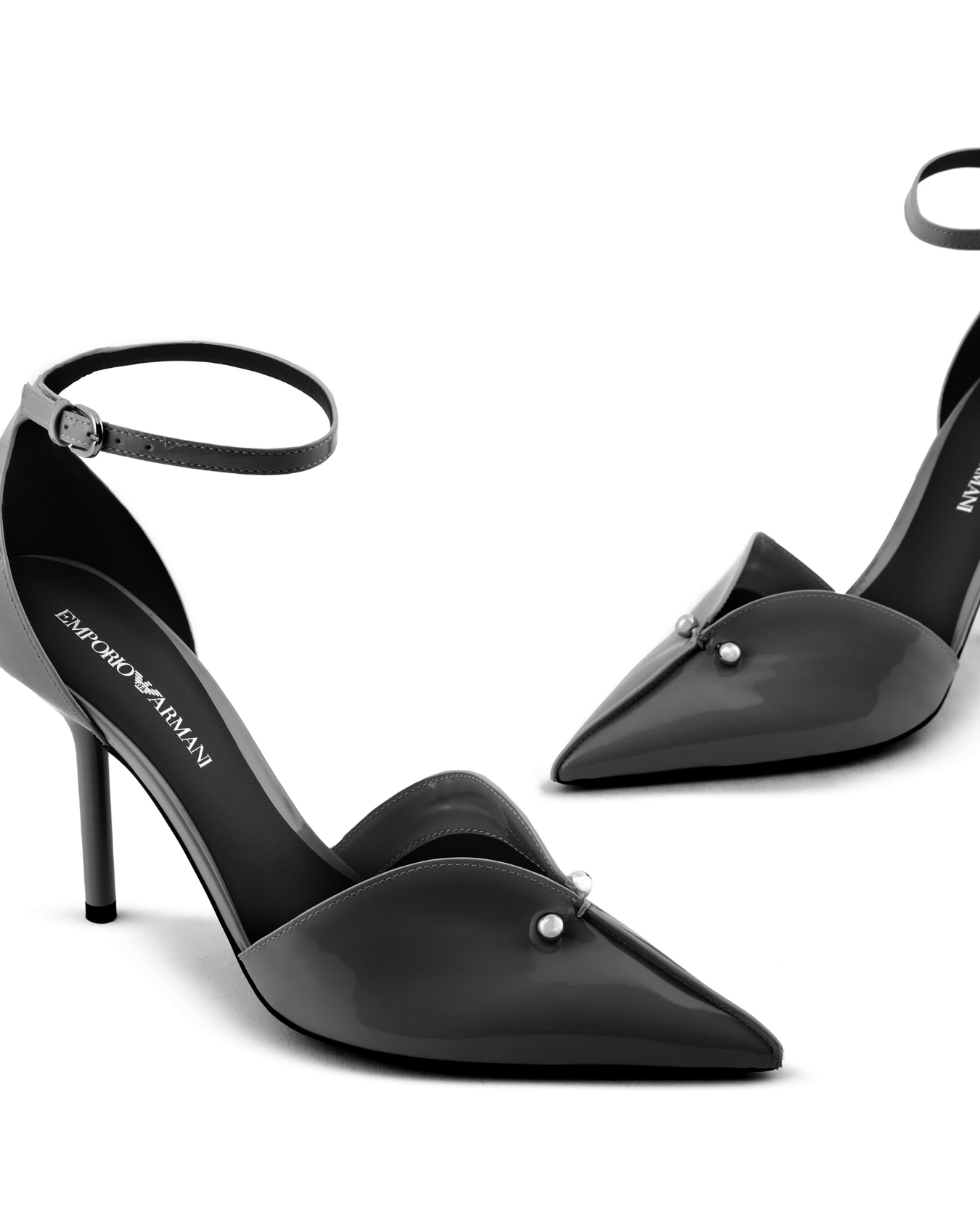Patent-leather pointed court shoes with strap and piercing Slide 4