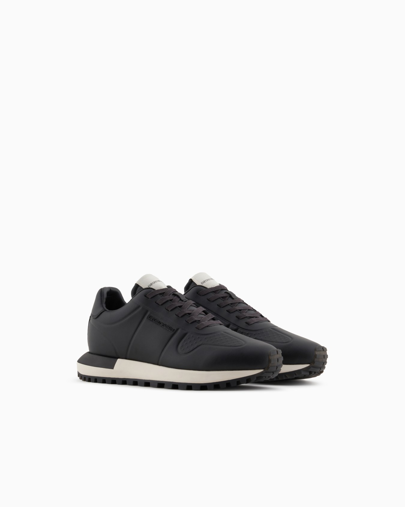 Leather sneakers with thermoformed details Slide 1