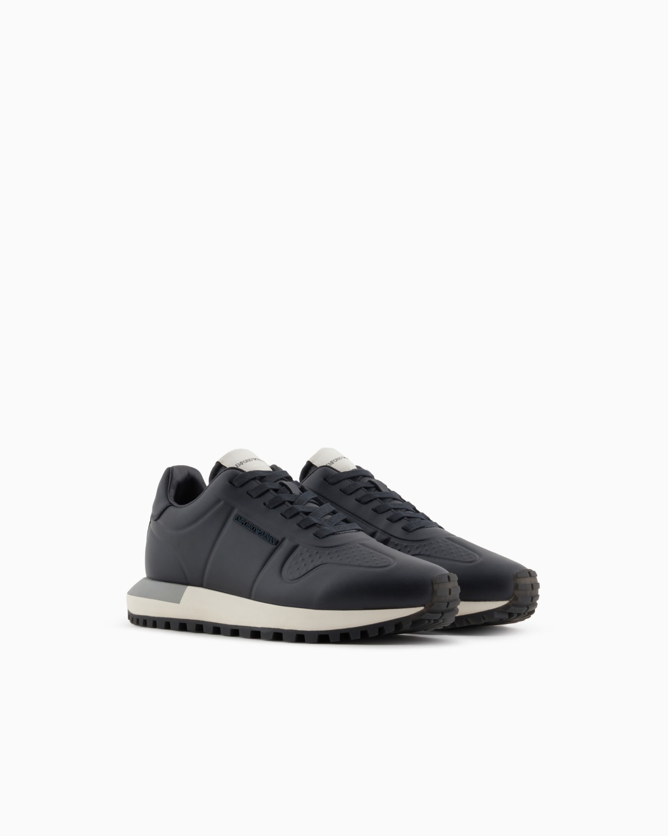 Leather sneakers with thermoformed details Slide 1