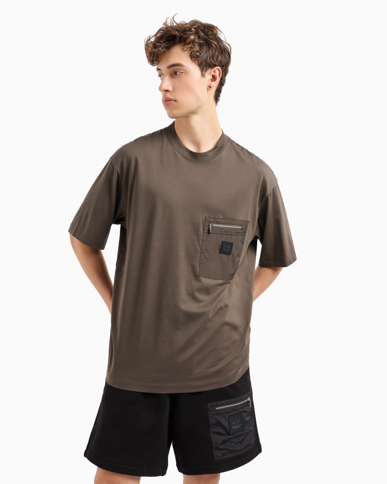 Relaxed fit T-shirt with zip pocket and logo Slide 1