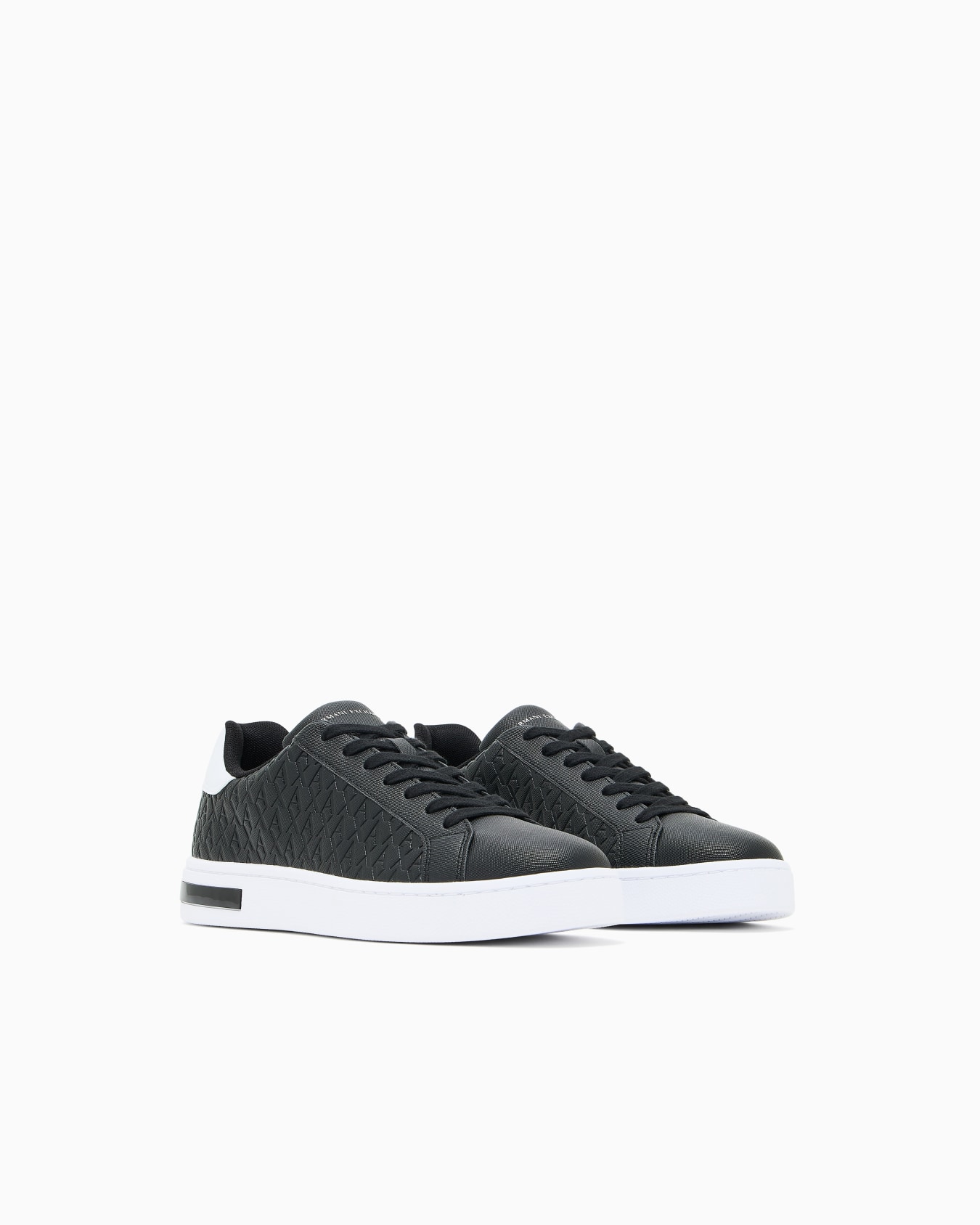 Lace-up sneakers with allover embossed logo Slide 1