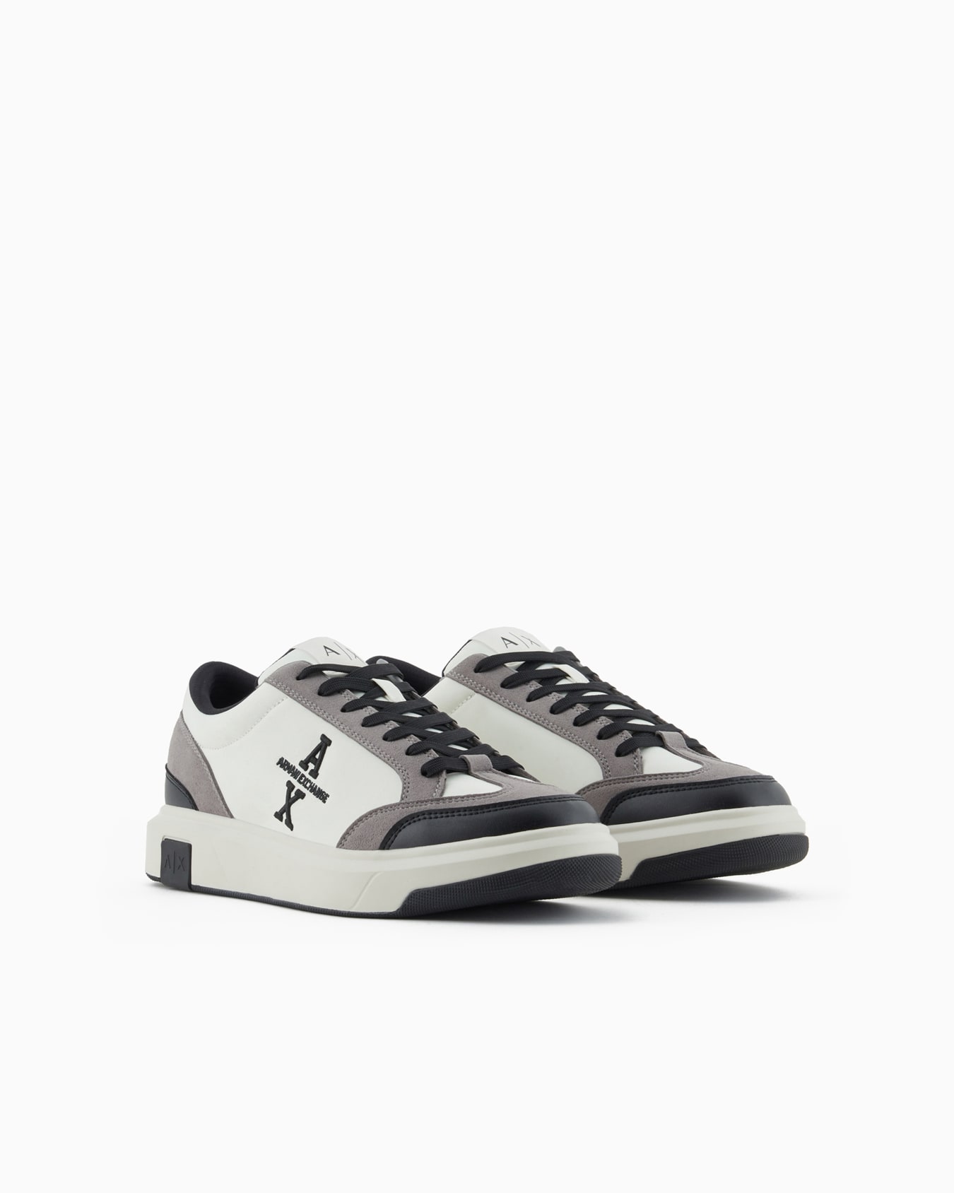 Sneakers with contrasting details and side logo Slide 1
