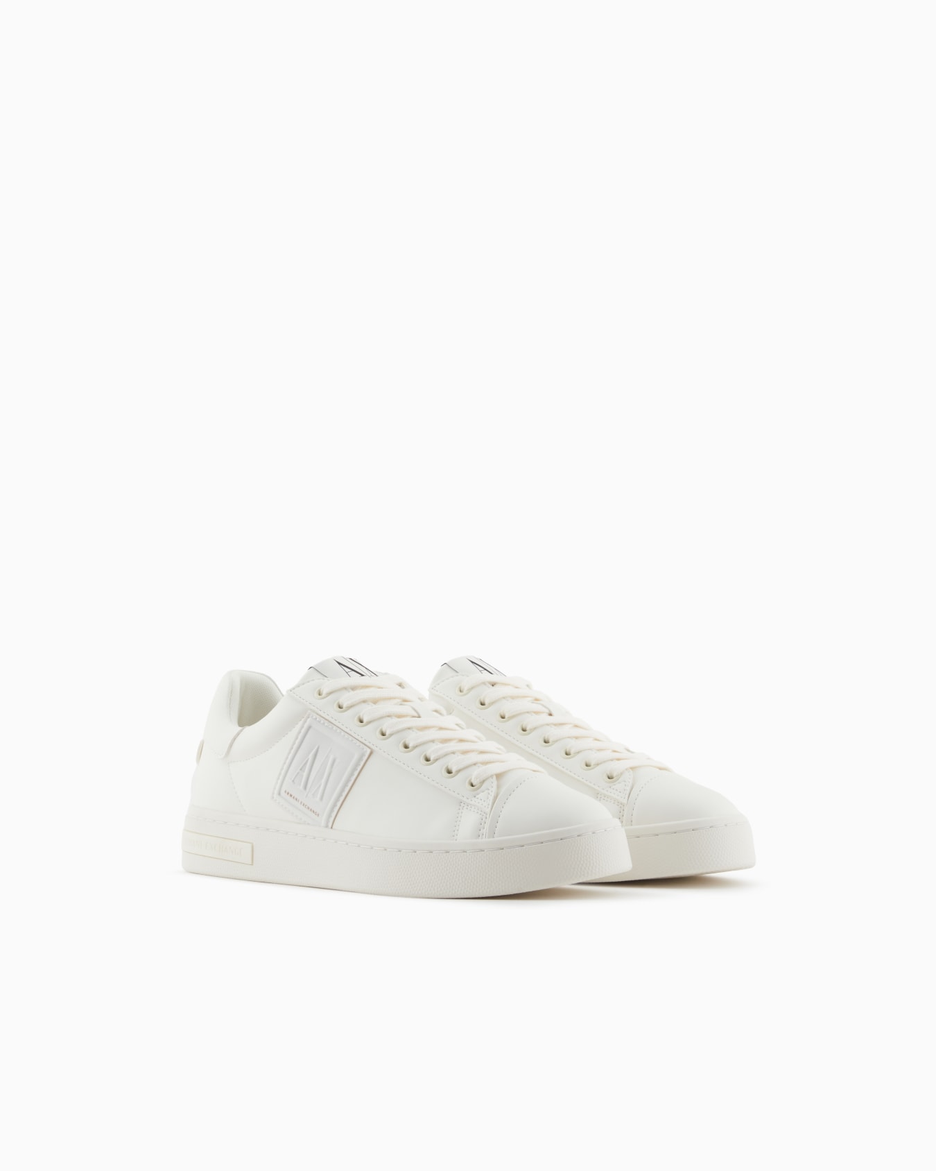Sneakers with logo patch Slide 1