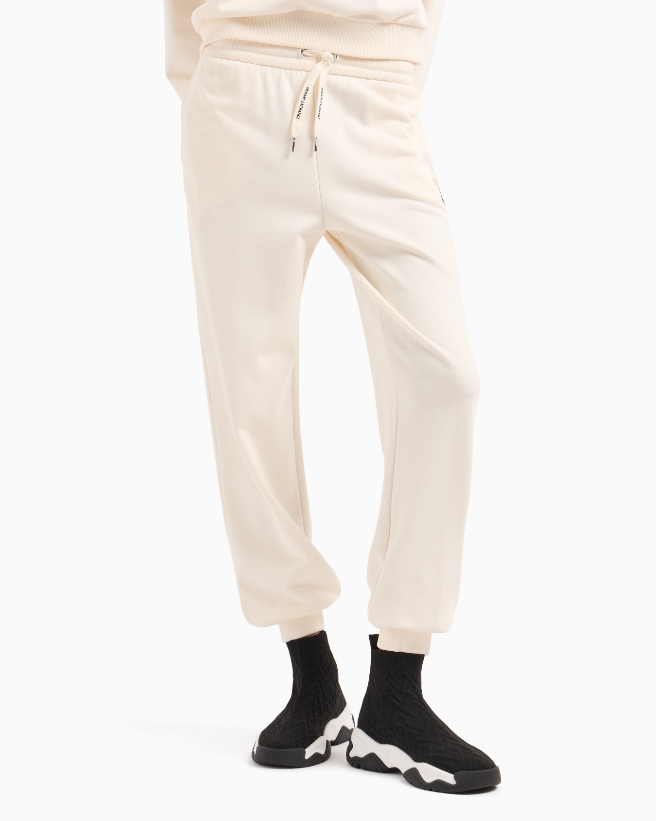 Jogger pants with logo label Slide 1