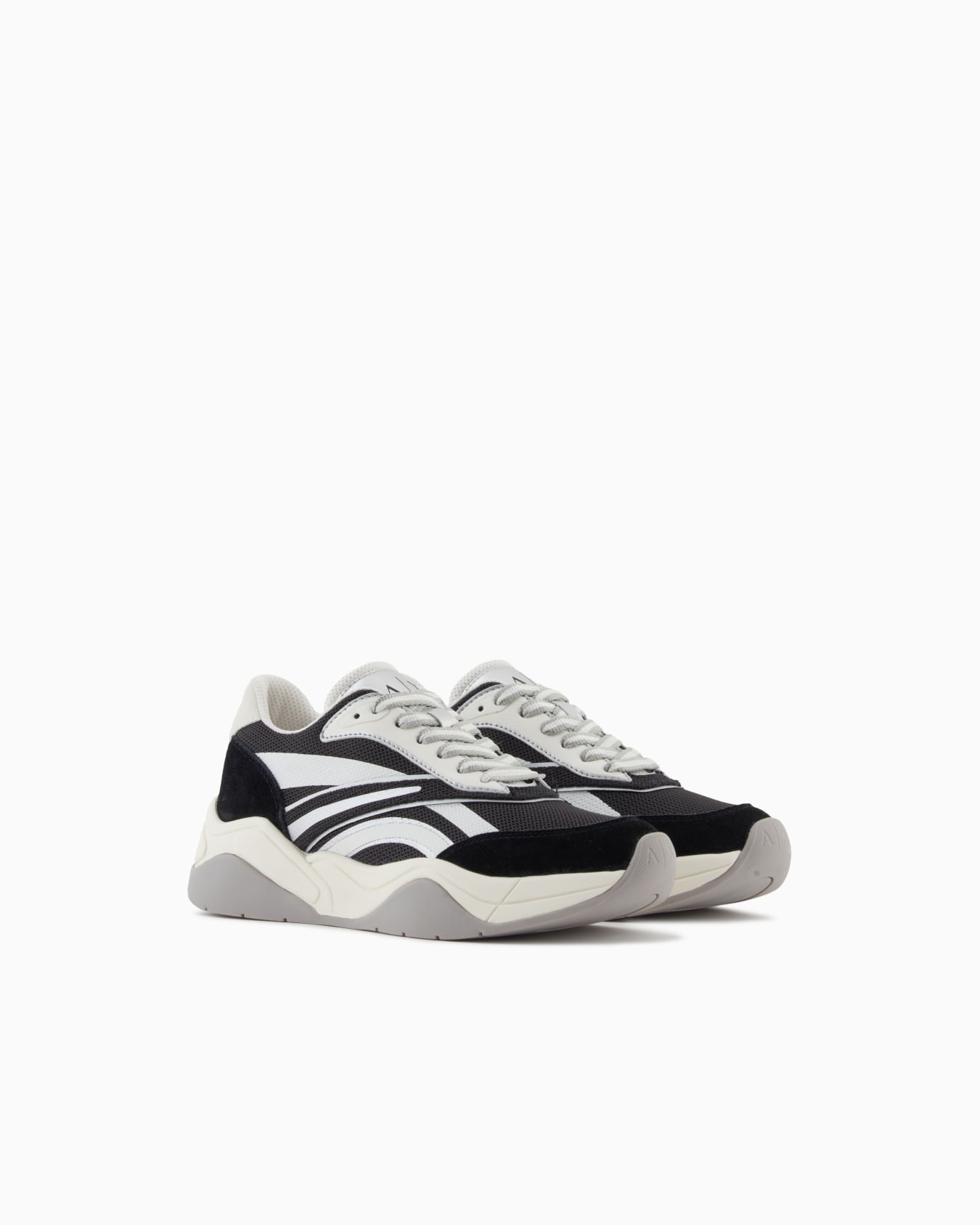 Leather sneakers with contrasting inserts Slide 1
