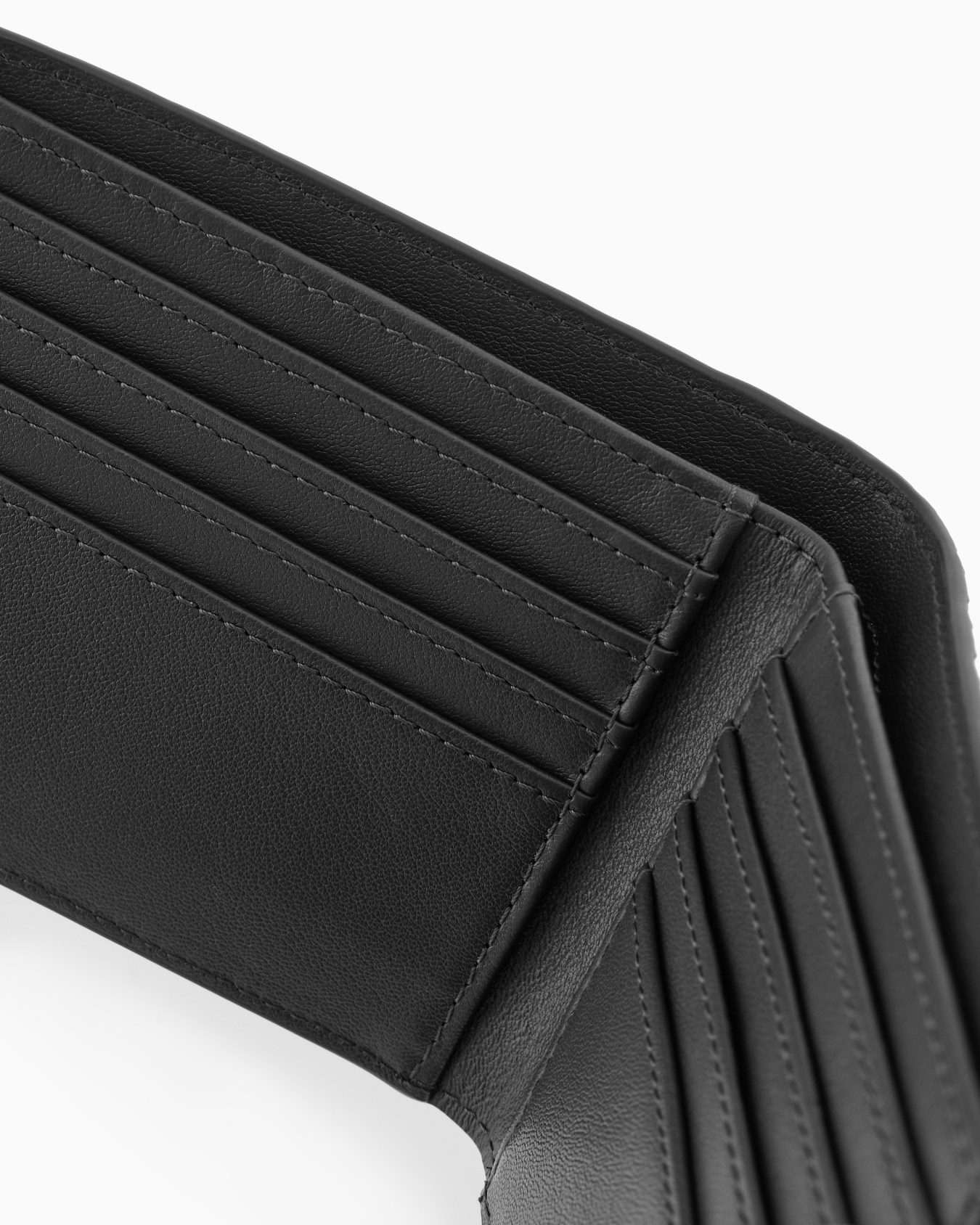 Leather bifold wallet with all-over embossed pattern Slide 3