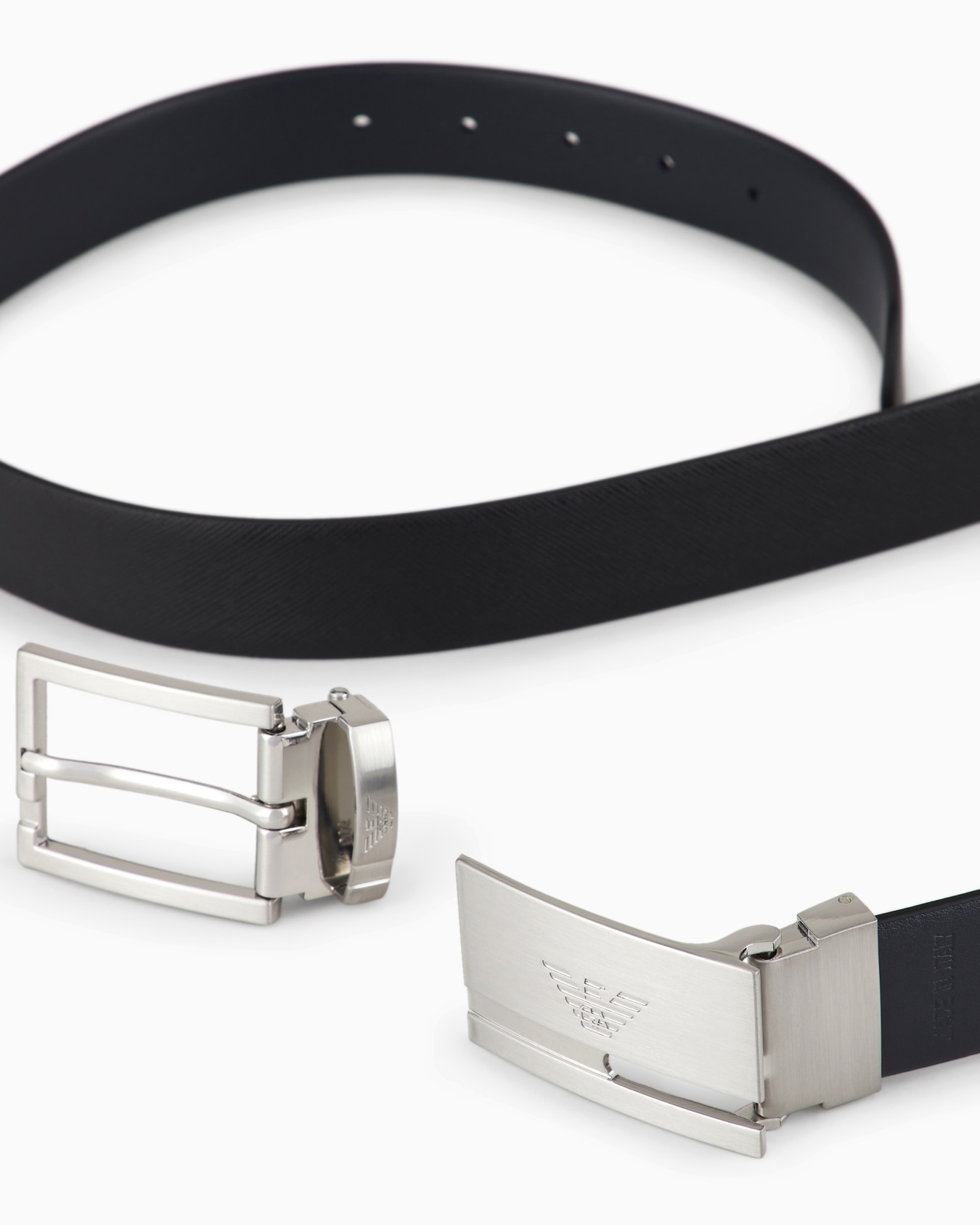 Reversible belt in two-tone leather with all-over embossed eagle Slide 1