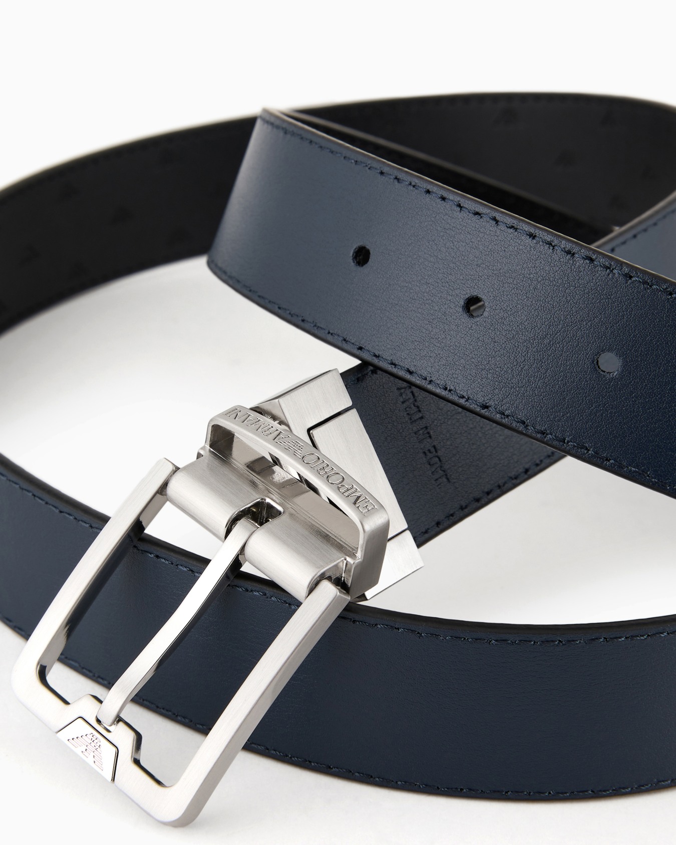 Reversible leather belt with all-over embossed eagle Slide 1