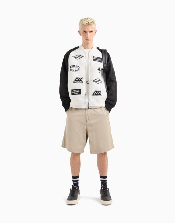 Mesh sneakers with rubber logo