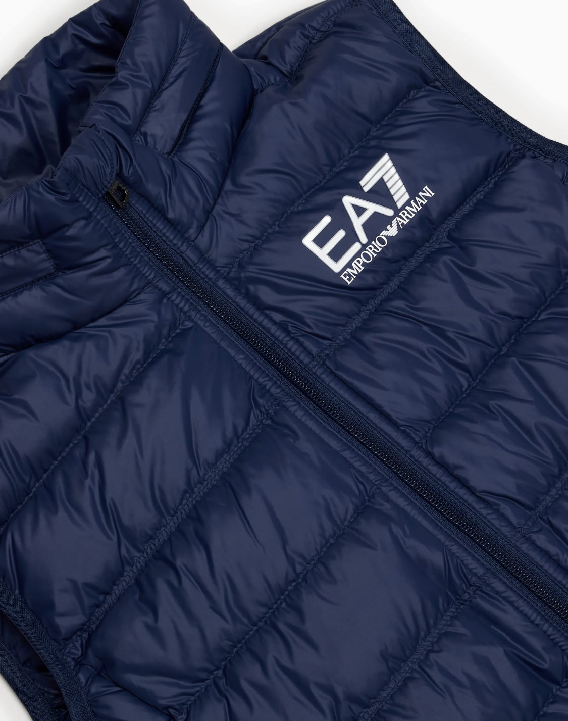 chaleco-acolchado-plegable-core-identity-boy-azul-marino--ea7