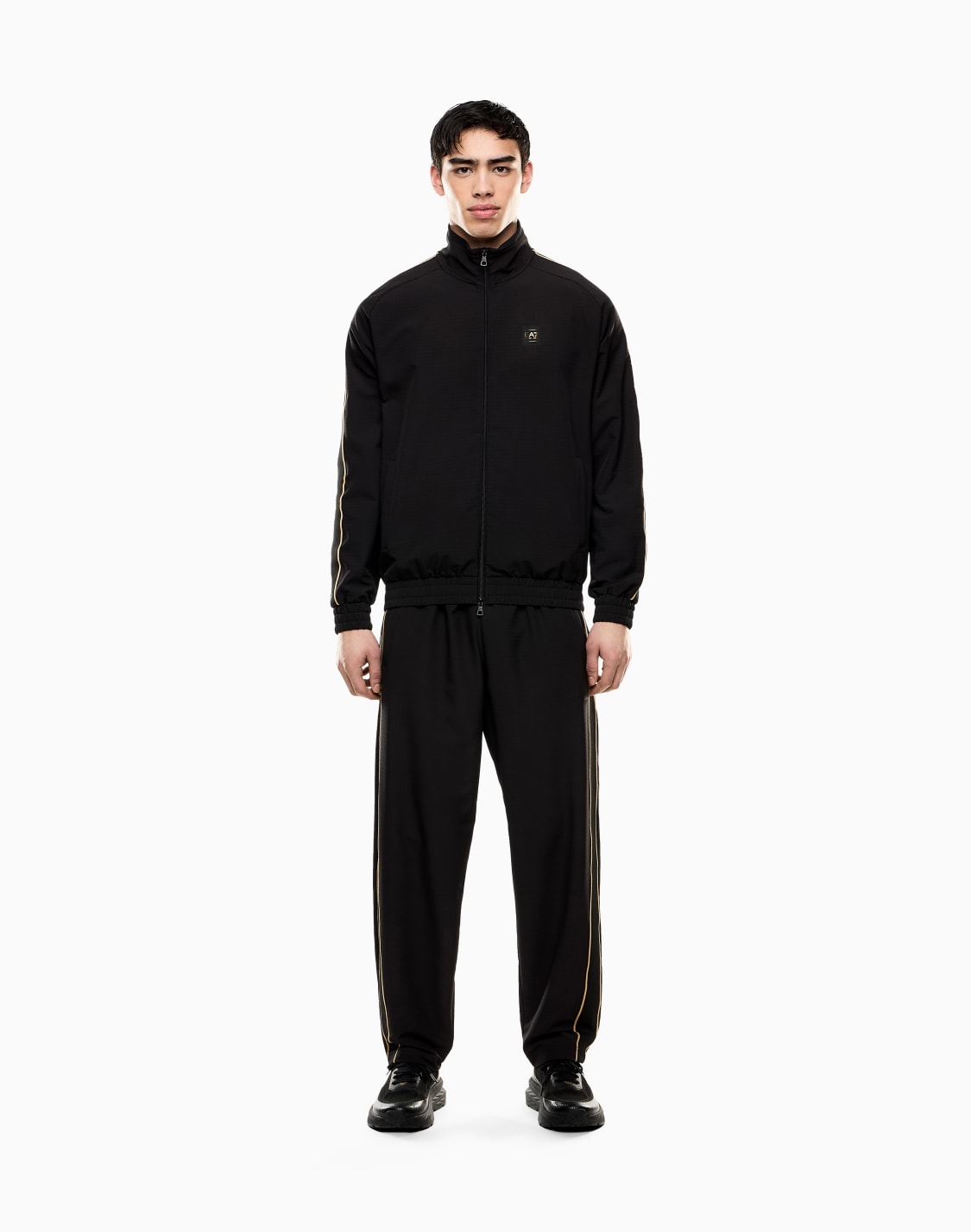 tuta-soccer-in-tessuto-tecnico-stretch-nero--ea7