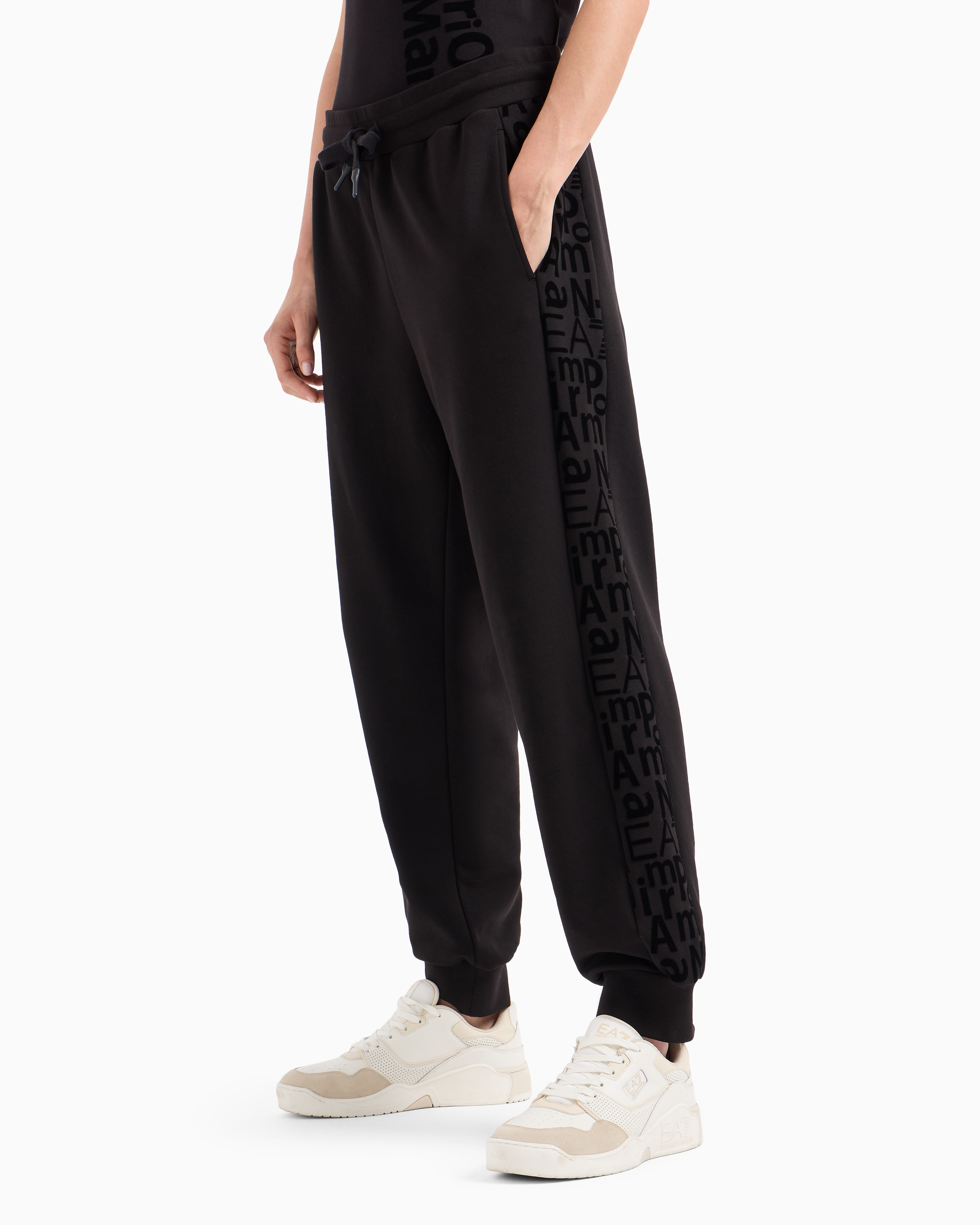 Shop Ea7 Graphic Series Joggers In Organic Cotton And Stretch Modal In Black