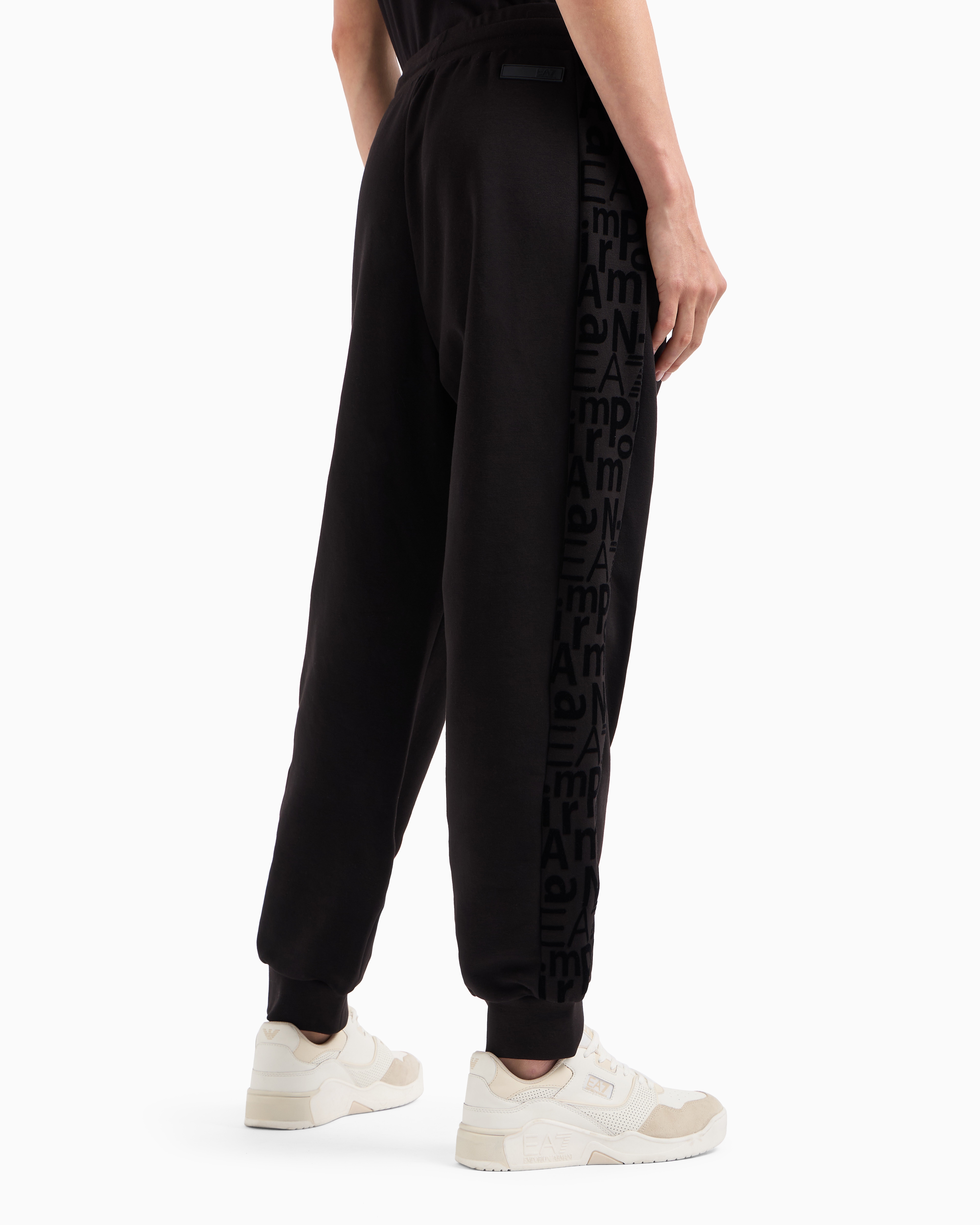 Shop Ea7 Graphic Series Joggers In Organic Cotton And Stretch Modal In Black