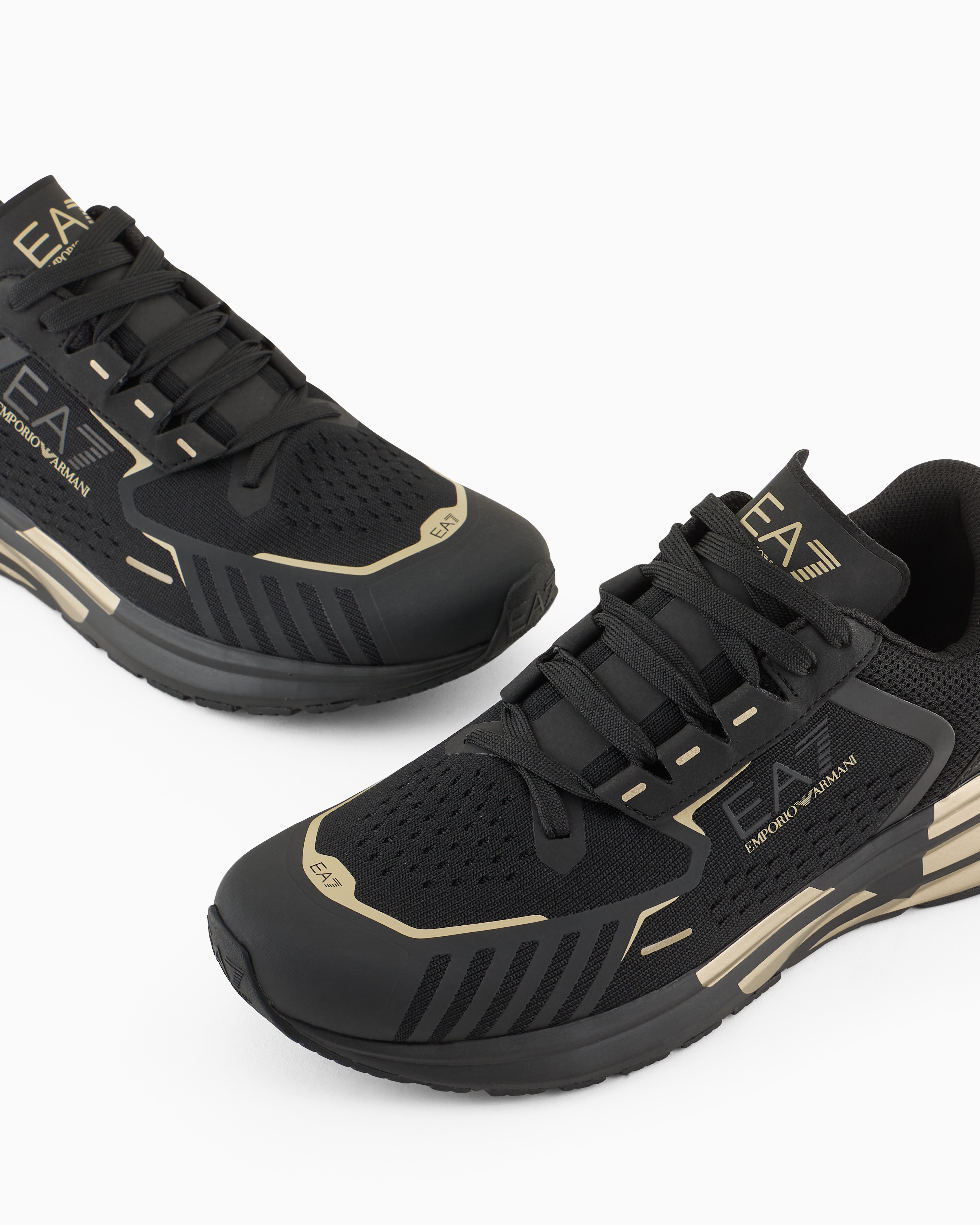 Shop Ea7 Crusher Distance Reflex Sneakers In Gold