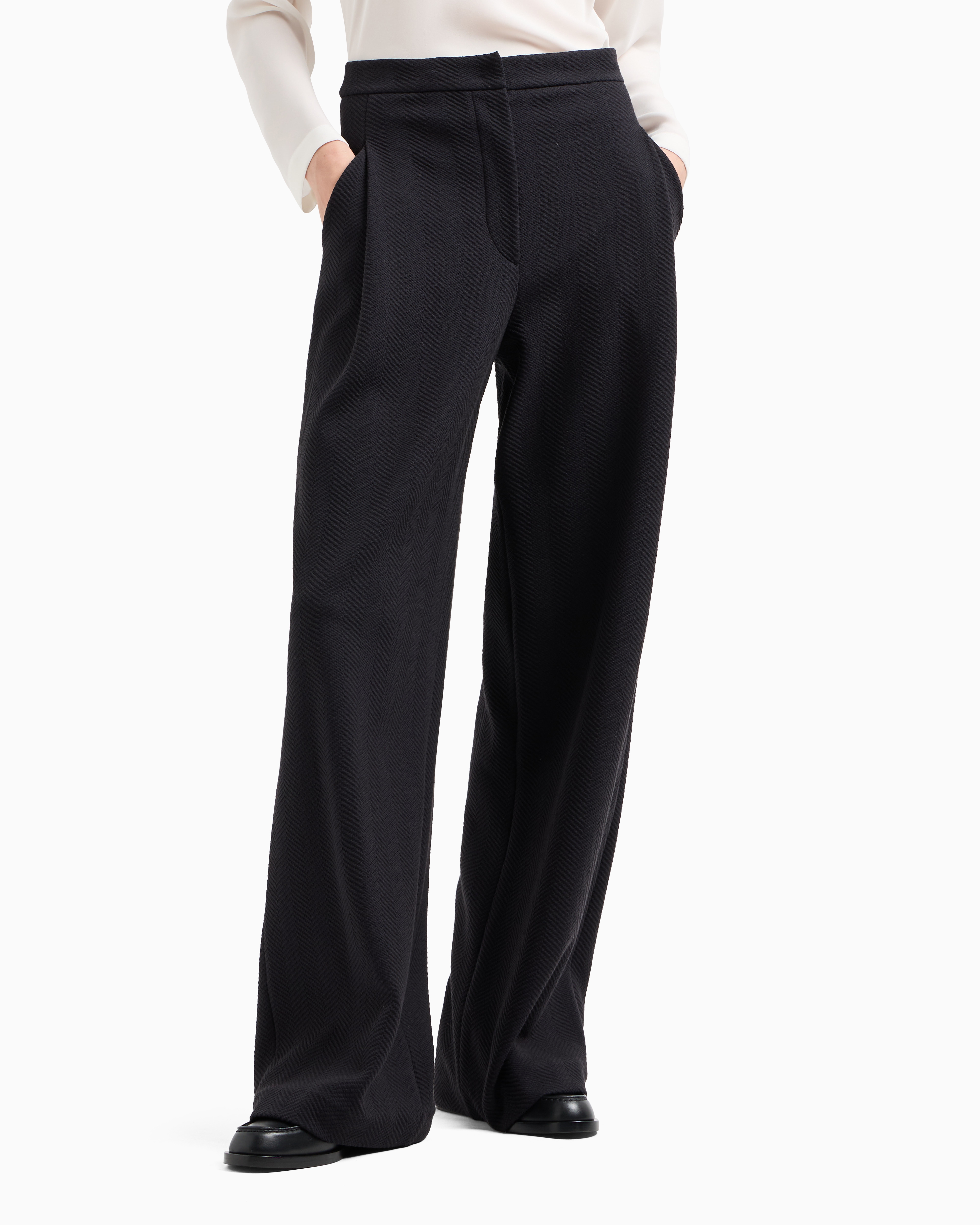 Shop Emporio Armani Icon Jacquard Jersey Knit Trousers With An Embossed Chevron Design In Noir