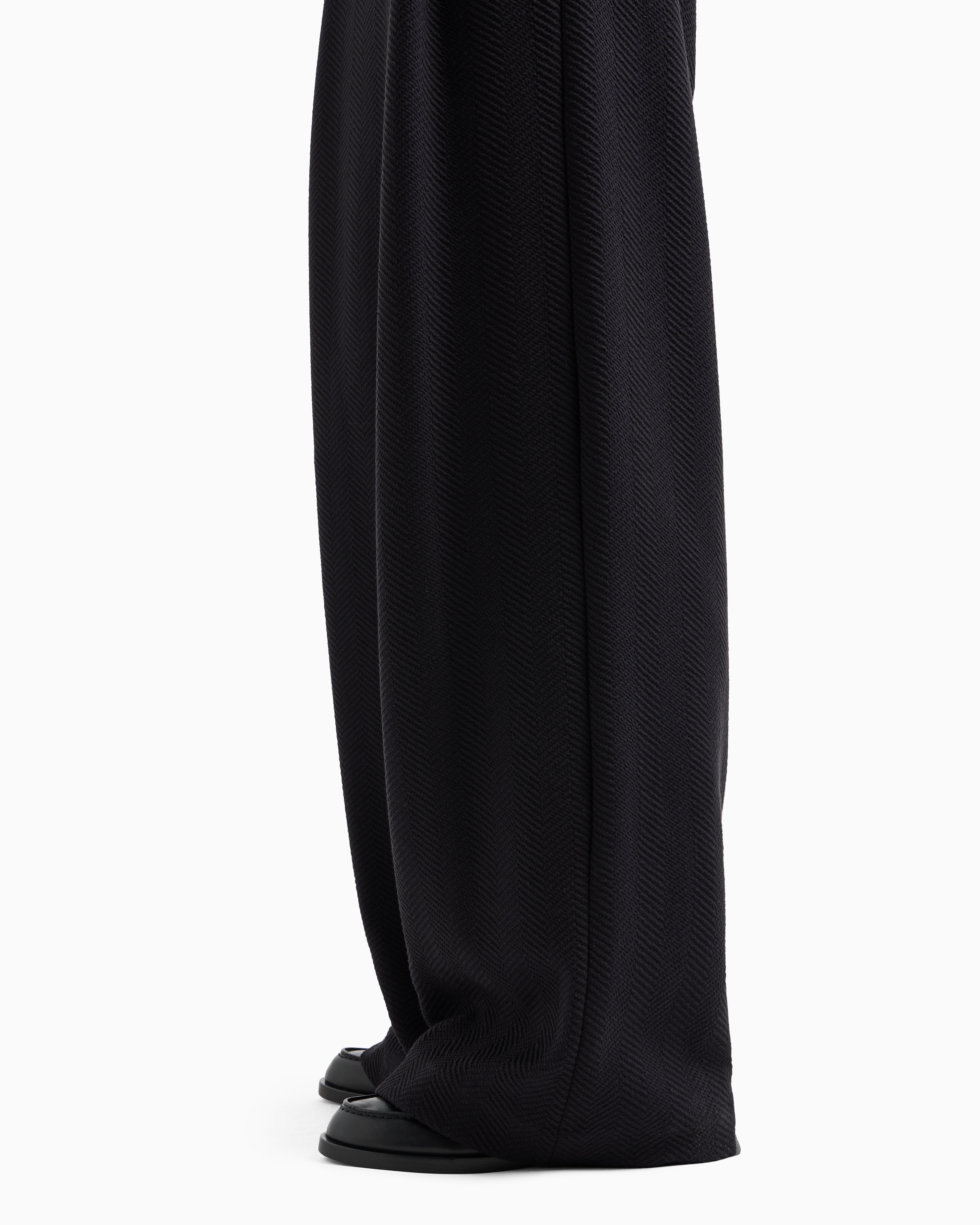 Shop Emporio Armani Icon Jacquard Jersey Knit Trousers With An Embossed Chevron Design In Noir