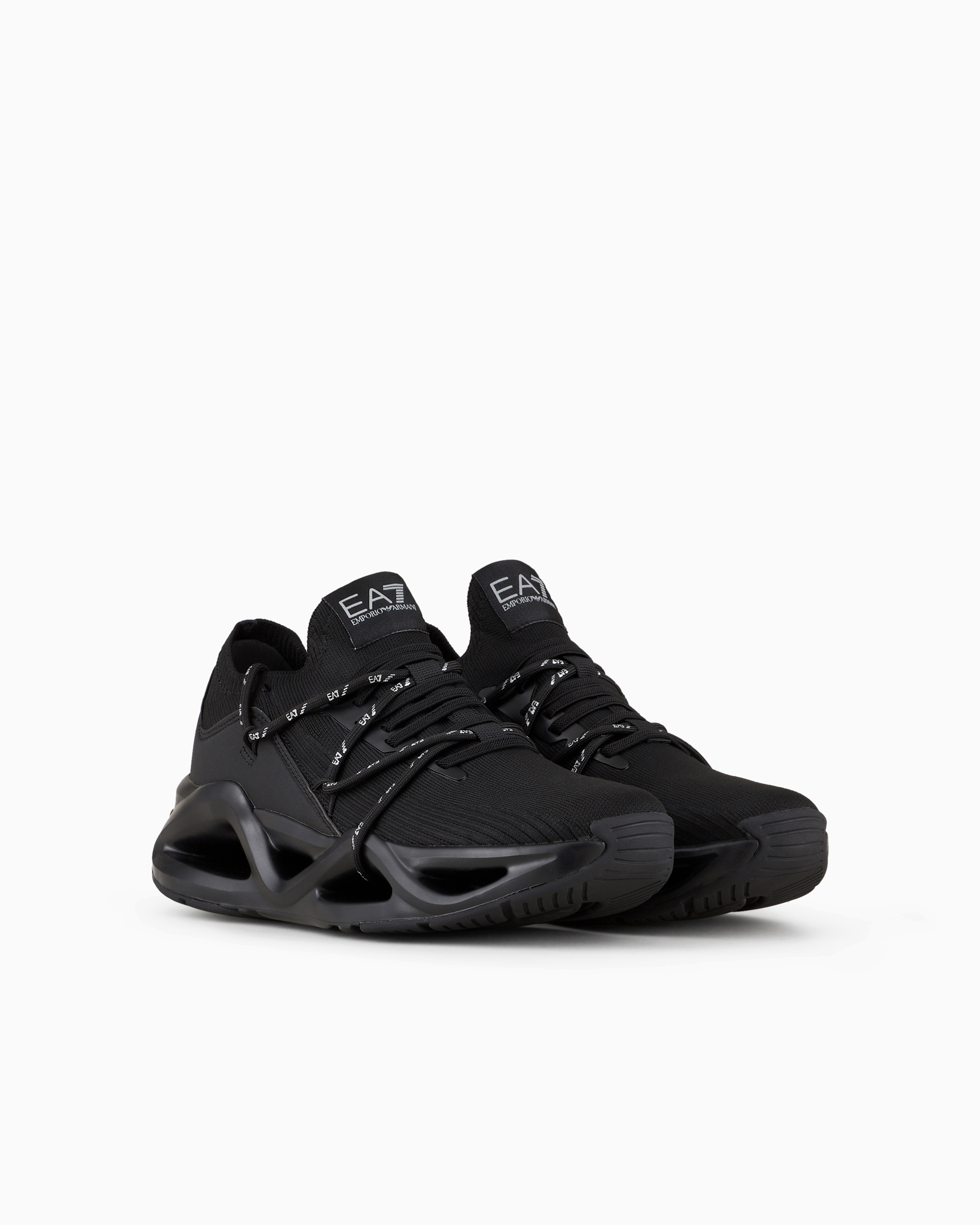 Shop Ea7 Infinity Knit Sneakers In Black