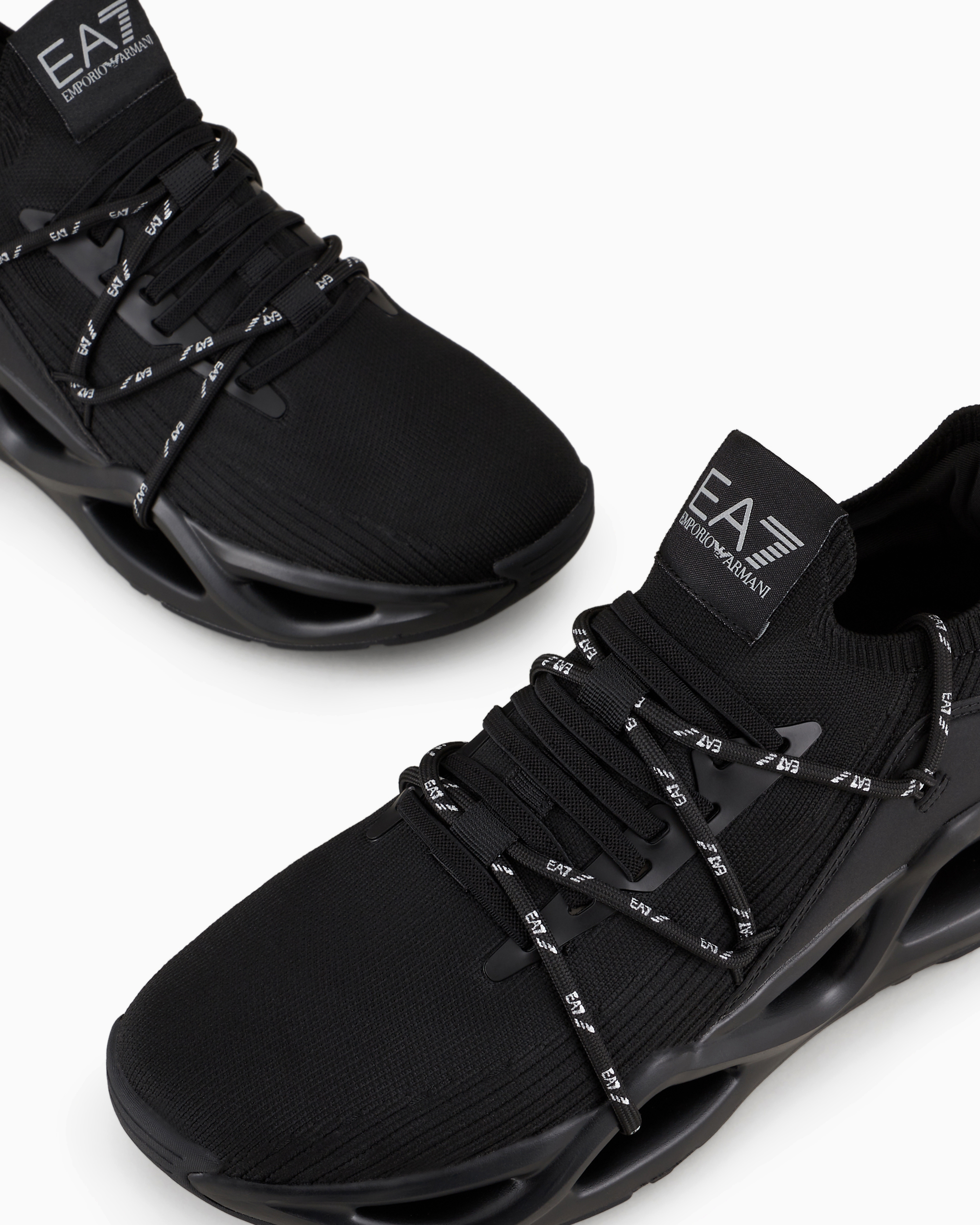 Shop Ea7 Infinity Knit Sneakers In Black