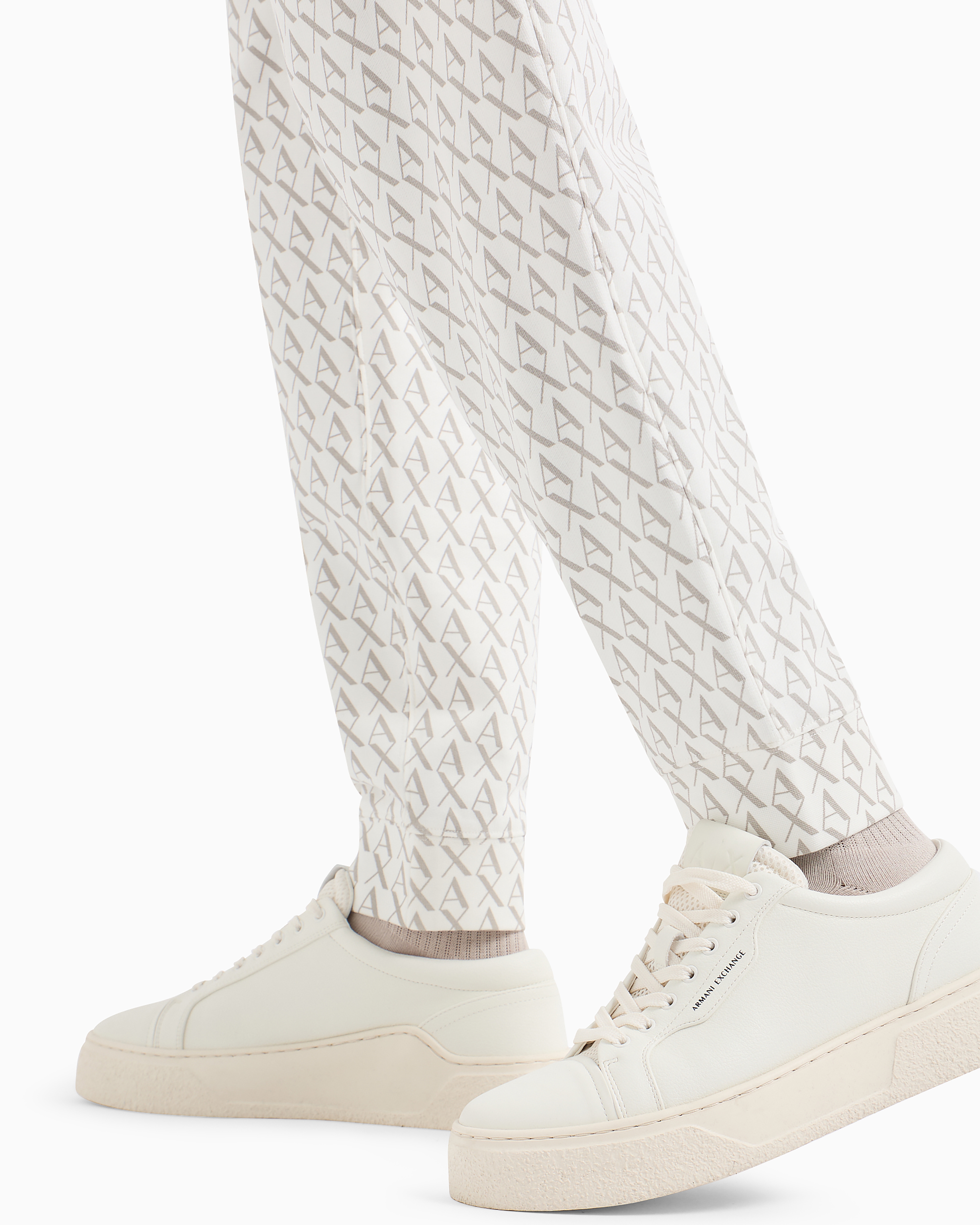 ARMANI EXCHANGE JOGGER PANTS IN FABRIC WITH ALLOVER LOGO PATTERN