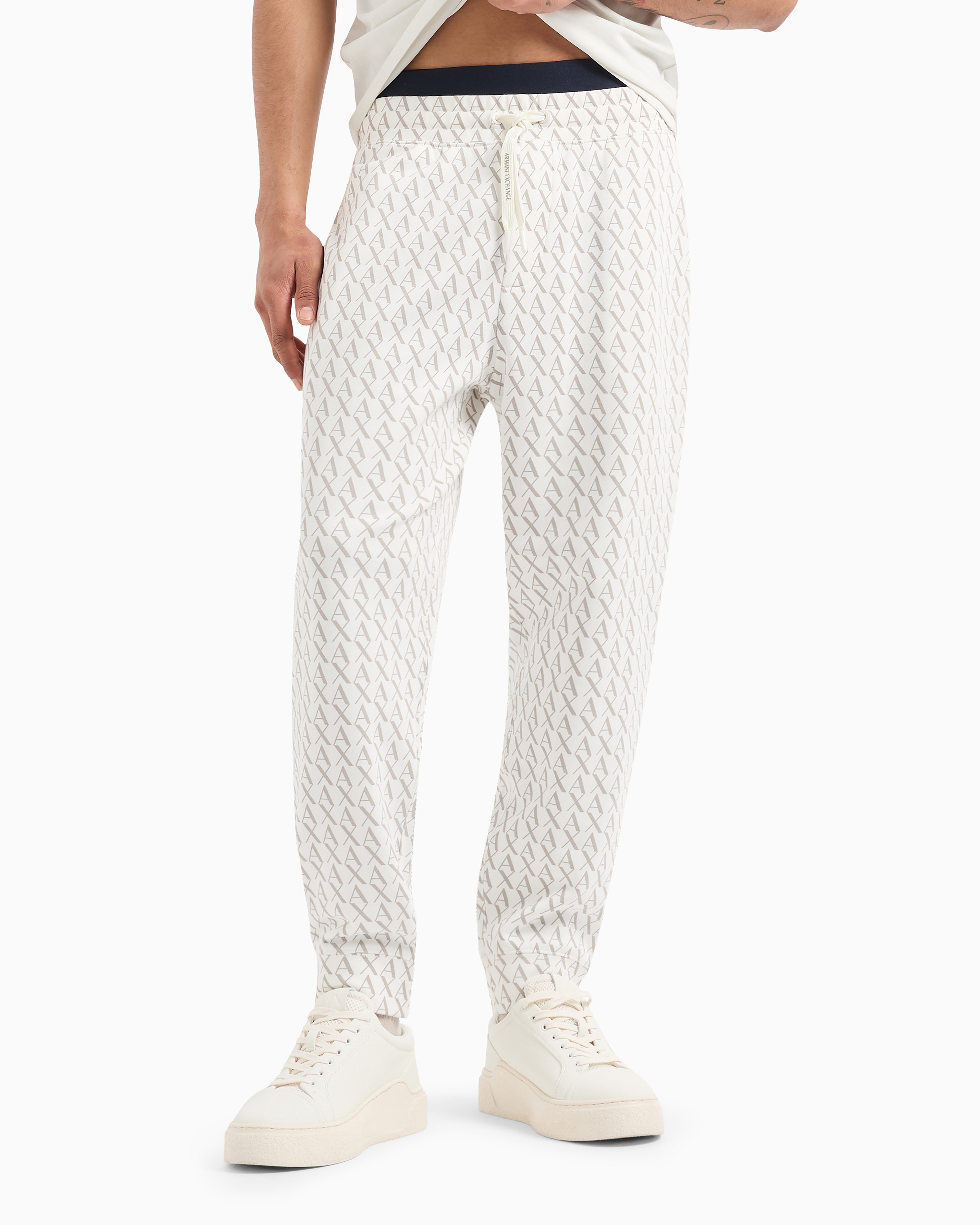 ARMANI EXCHANGE JOGGER PANTS IN FABRIC WITH ALLOVER LOGO PATTERN