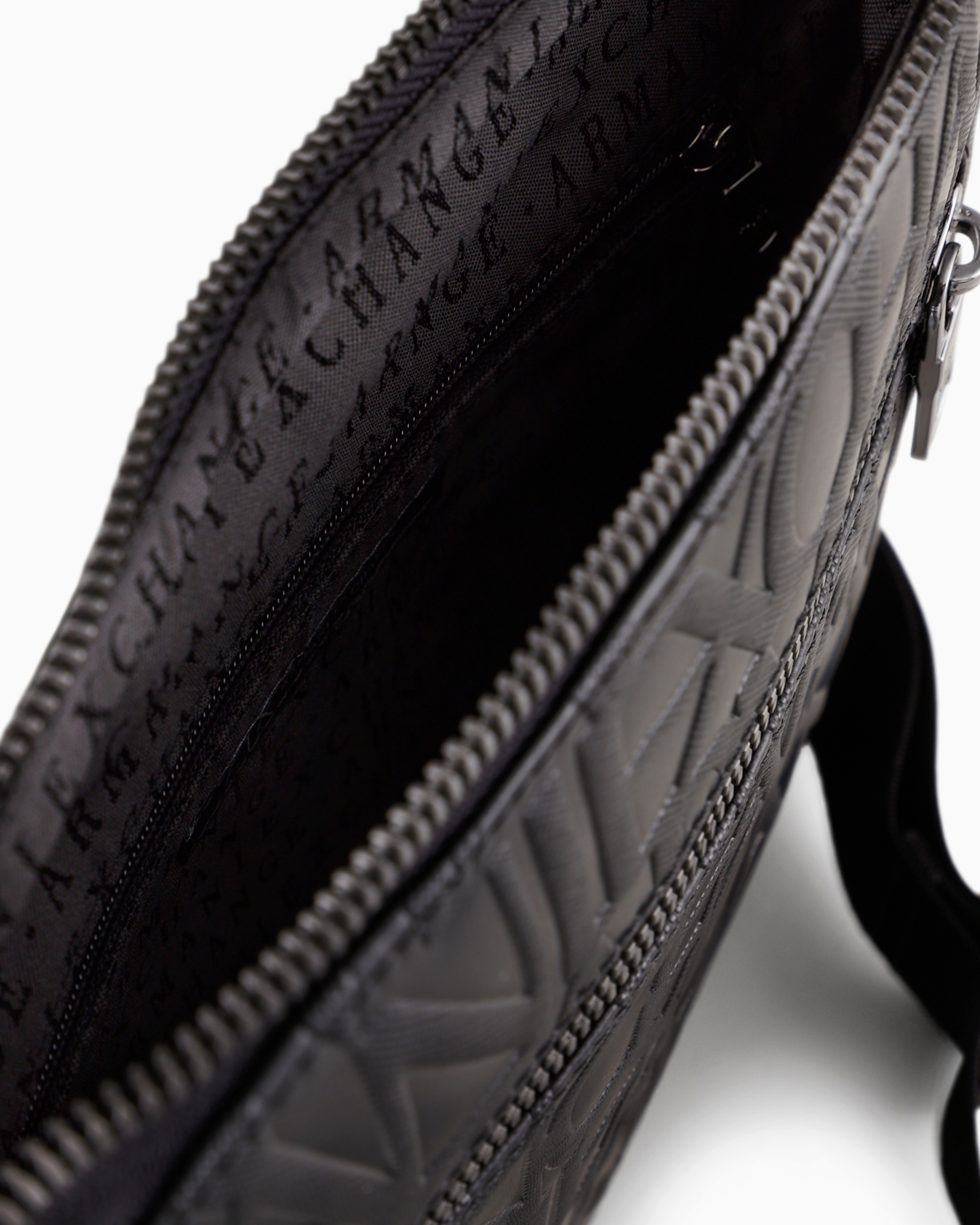 Armani Exchange Embossed-logo Messenger Bag In Black