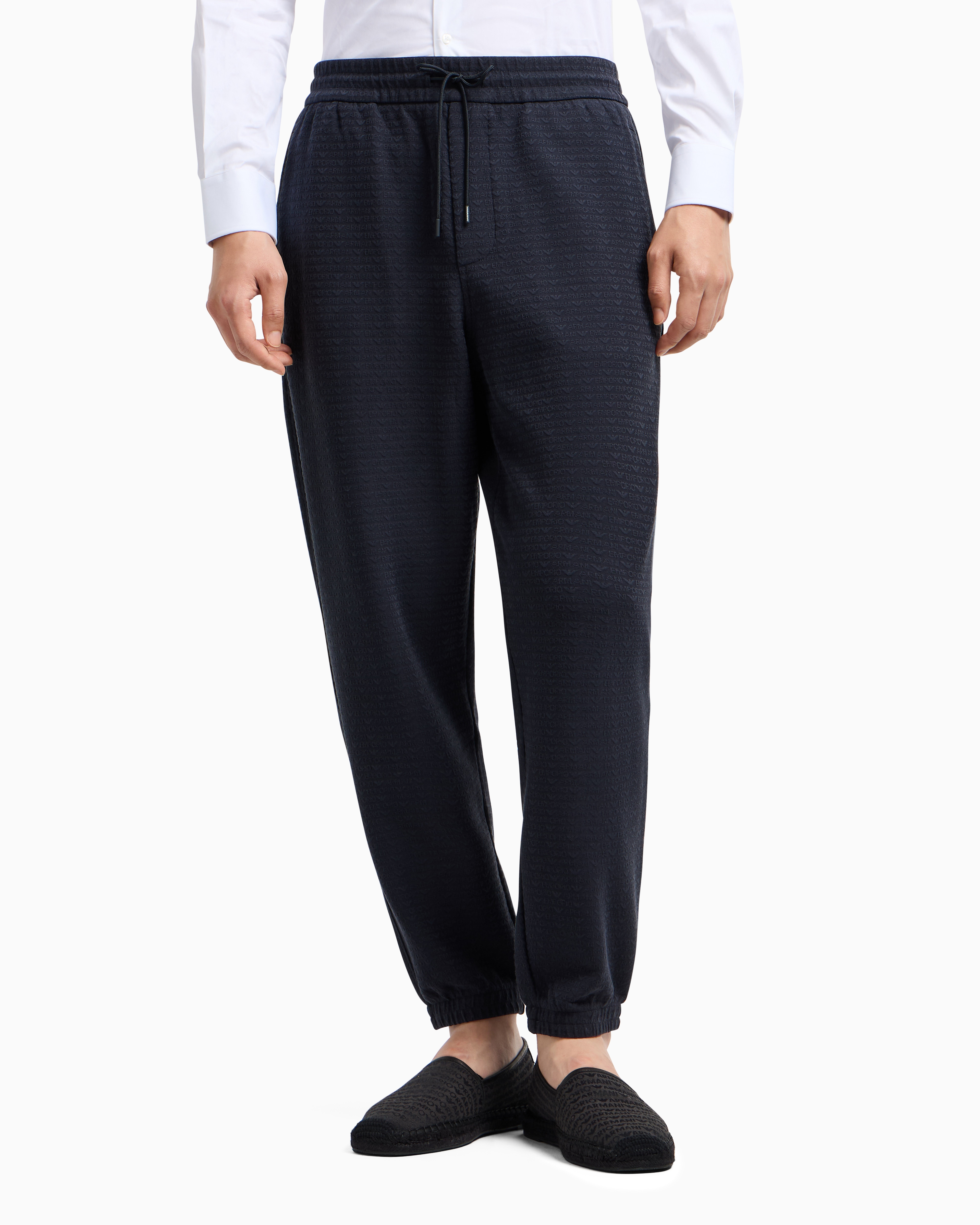 Emporio Armani Asv Lyocell Blend Jersey Joggers With All-over Lettering In Navy Blue