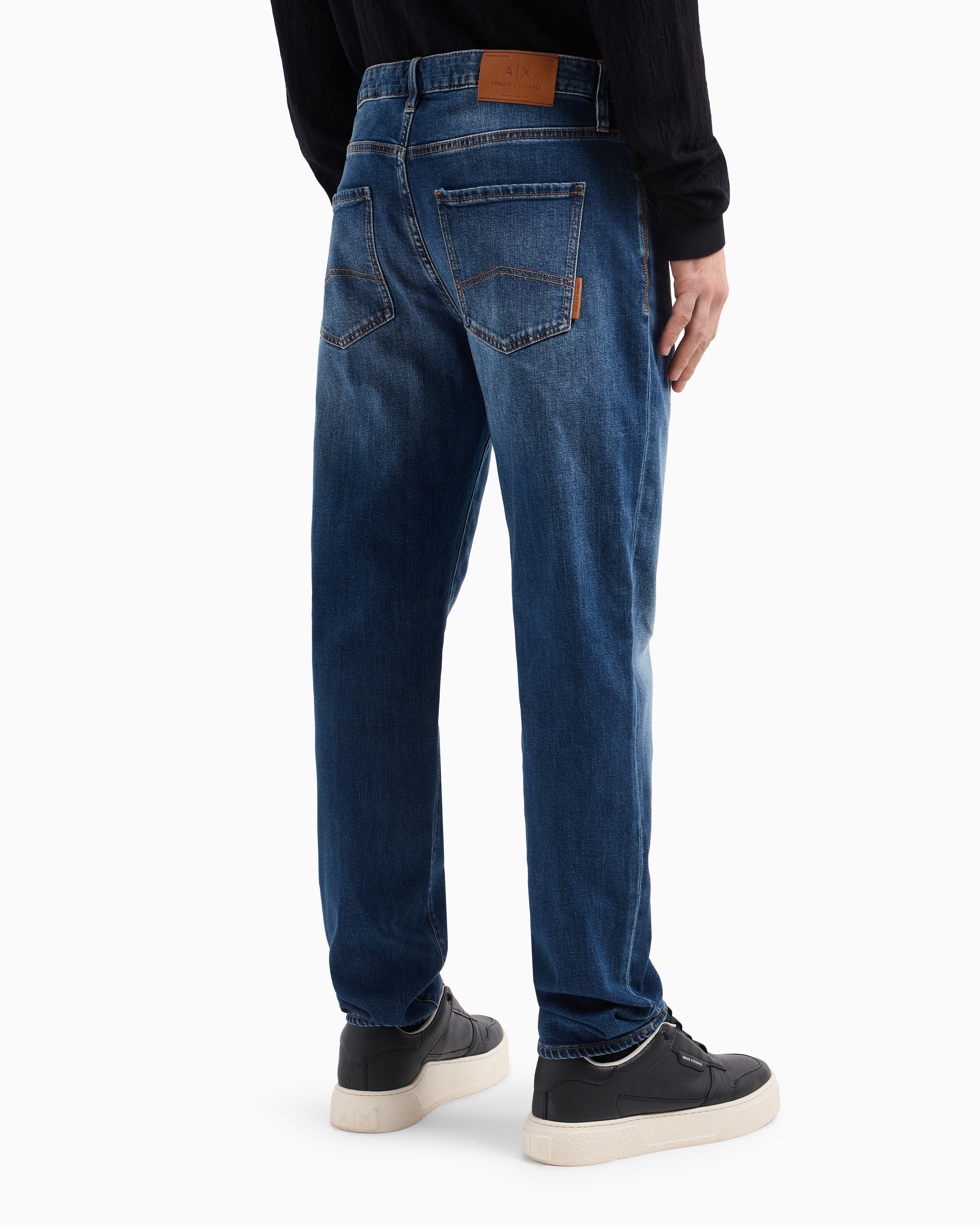 J13 slim fit jeans in stone washed cotton denim with rips