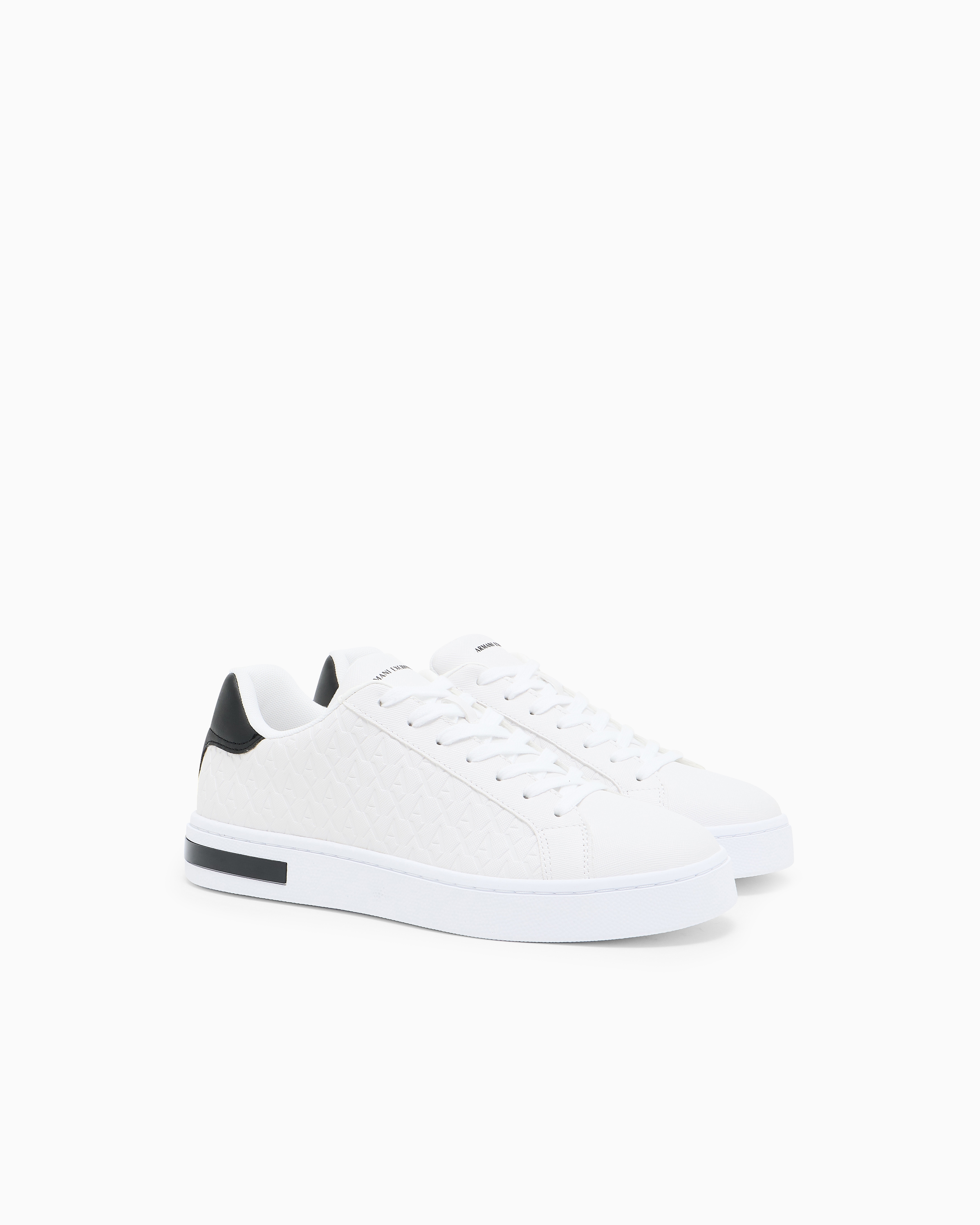 Lace-up sneakers with allover embossed logo | Armani Exchange