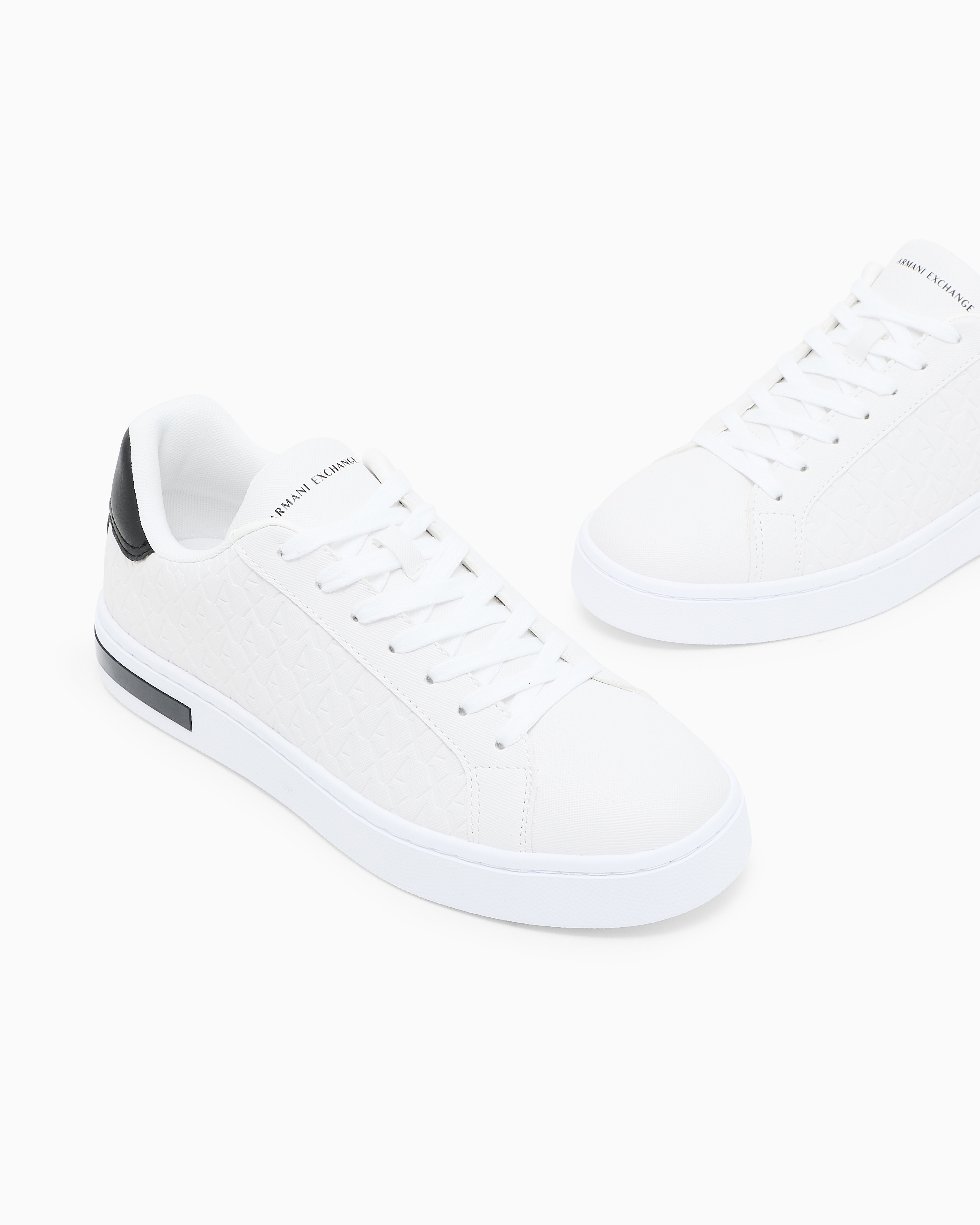 Lace-up sneakers with allover embossed logo | Armani Exchange