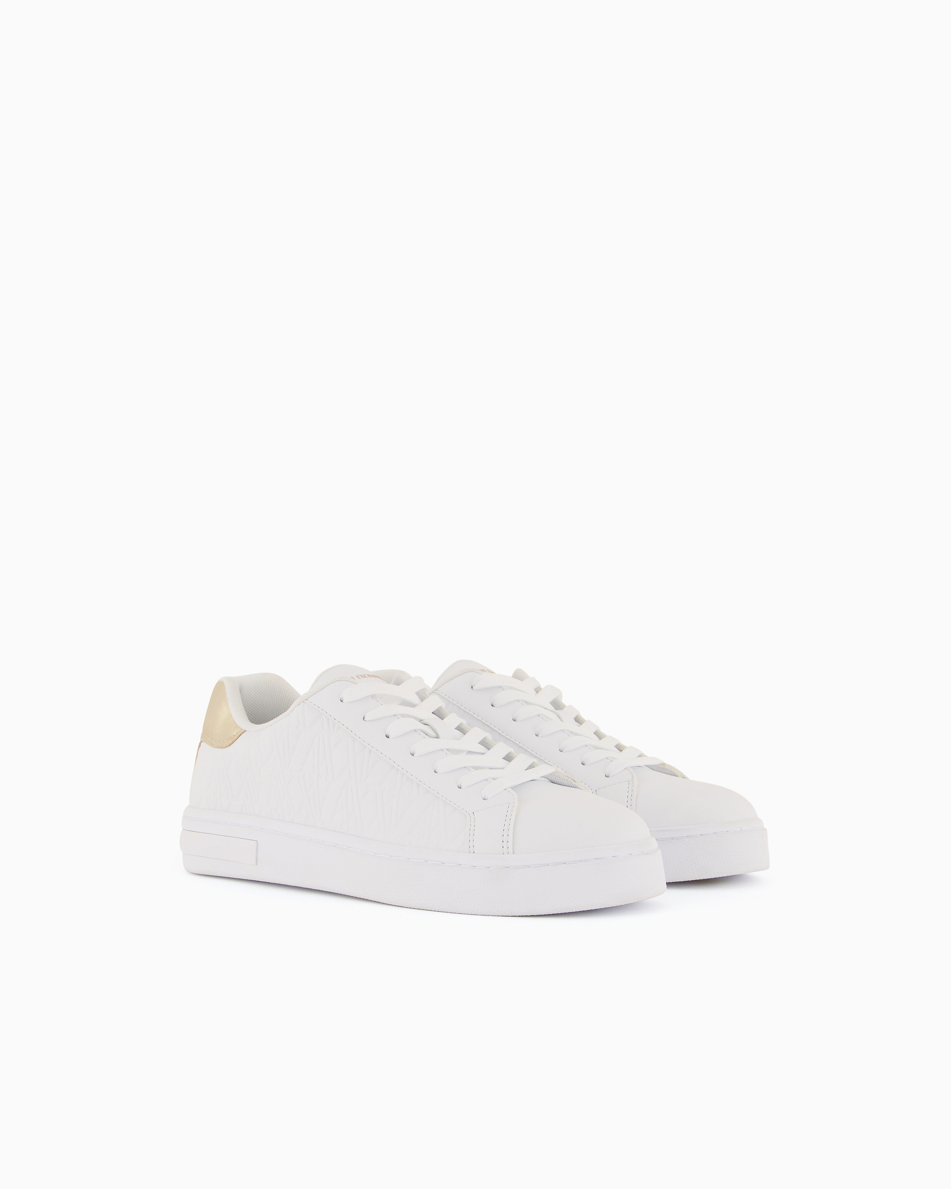 Sneakers with matching embroidered logo and metal detail